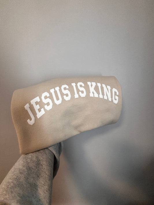 Jesus is King - white puff on cream